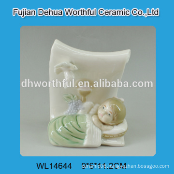 Decorative ceramic sleeping baby statue,ceramic cradle baby in high quality